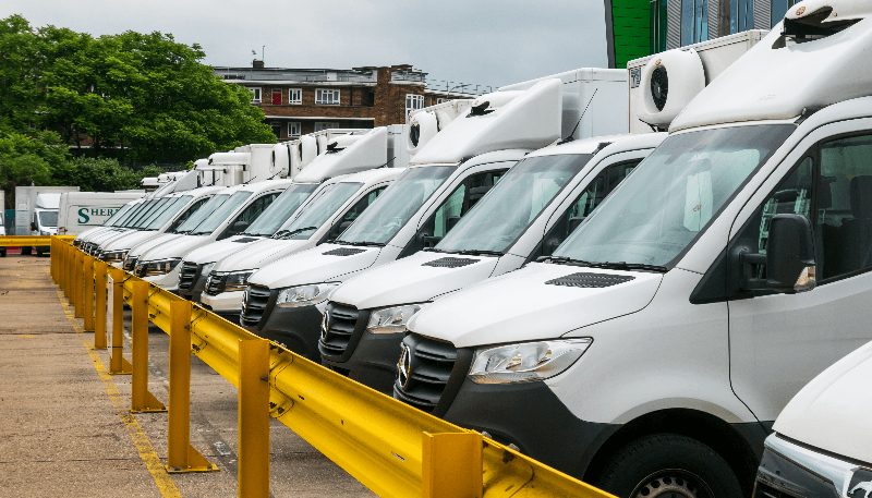 parked white transit vans