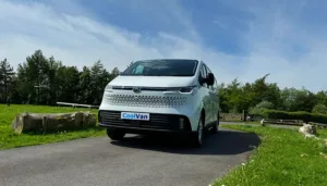 single refrigerated van driving on the road