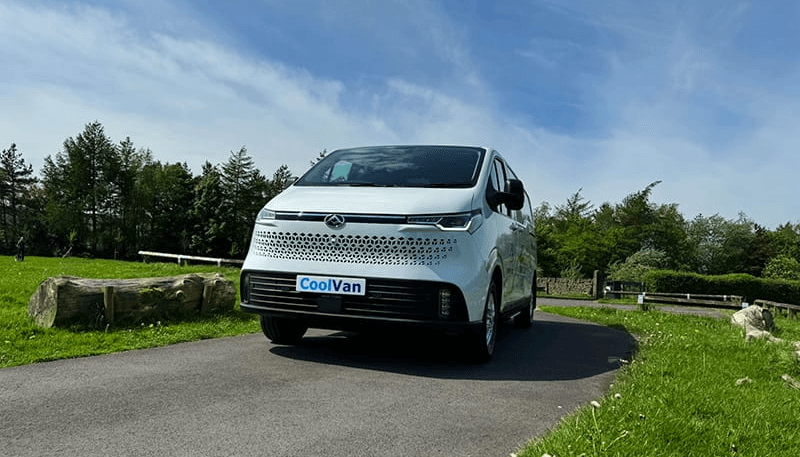 single refrigerated van driving on the road